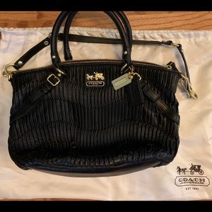 ON HOLD Coach black textured handbag